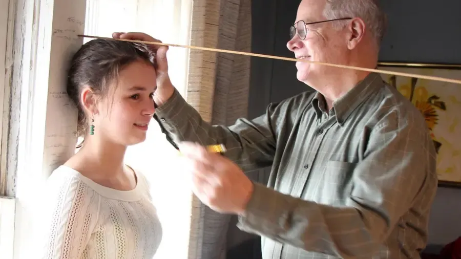 Quelle est la hauteur de 65 pouces ?